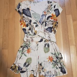 Tropical Romper fits like a Small XSmall